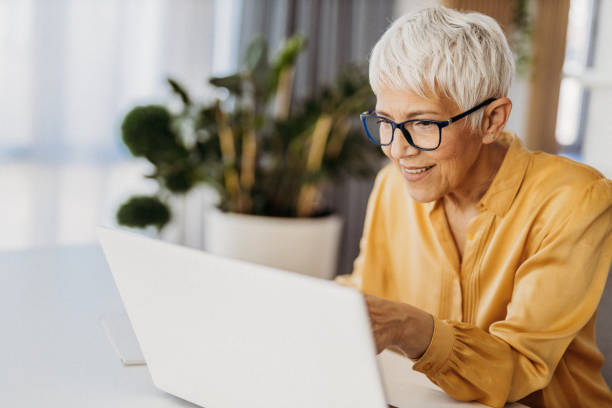 istock Senior woman working 1324129715