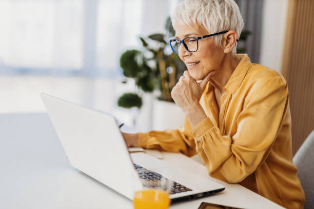 istock Senior woman working 1324129747