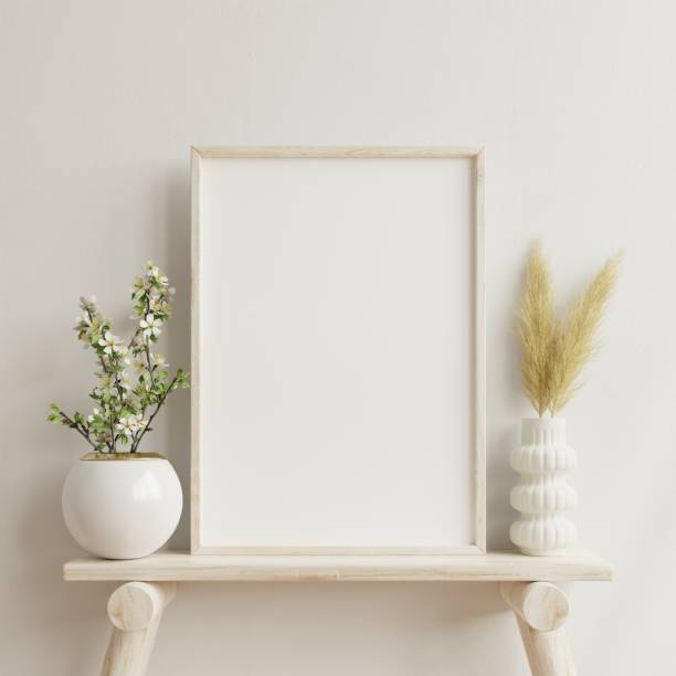 istock Interior poster mockup with vertical wooden frame in home interior background with vase. 1324130272