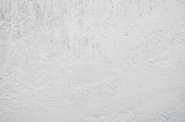 istock Cement and concrete grunge texture background painted to white 1324132775