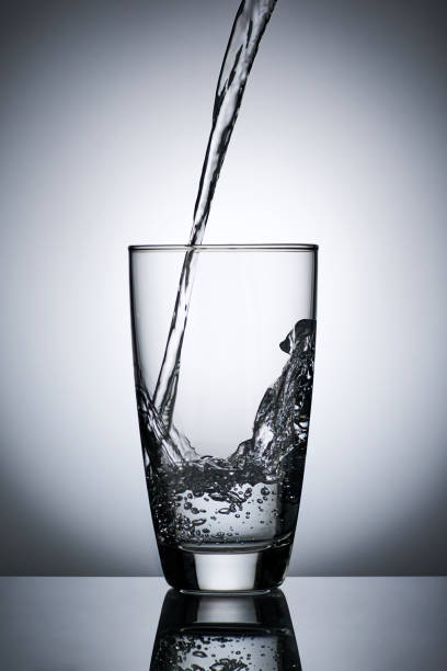 istock puring refreshment freshness drinking water on clean transperence glass in studio back light 1324142543
