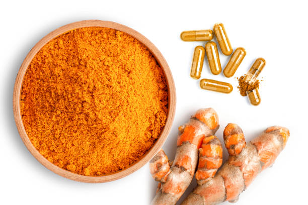 istock Turmeric powder medicine capsule pill. 1324145479