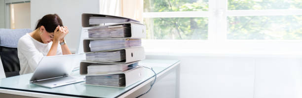 istock Frustrated Workaholic Woman At Computer Desk 1324145625