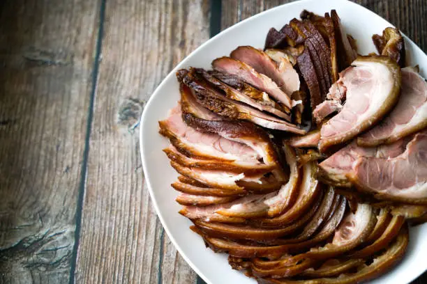 Photo of Chinese traditional gourmet sauce elbow. Slices of Chinese traditional cooked pork elbow.