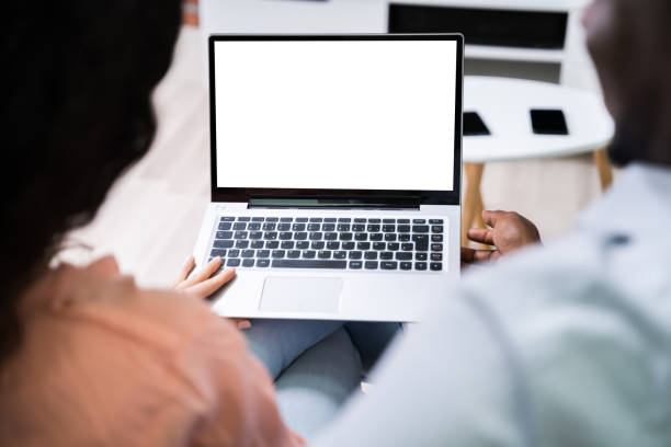 istock Close-up Of A Couple Using Laptop 1324147980