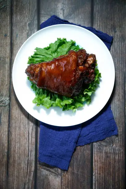 Photo of Chinese traditional gourmet sauce elbow. Slices of Chinese traditional cooked pork elbow.