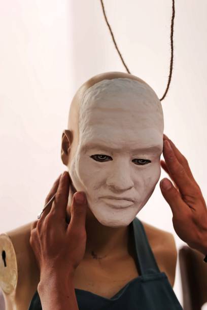 istock Artist making Horror Mannerquin Clay sculpture 1324154825