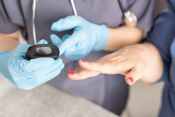istock Nurse uses pulse oximeter to measure elderly patient's blood oxygen saturation 1324154906