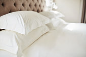 Shot pillows on a bed in a modern hotel
