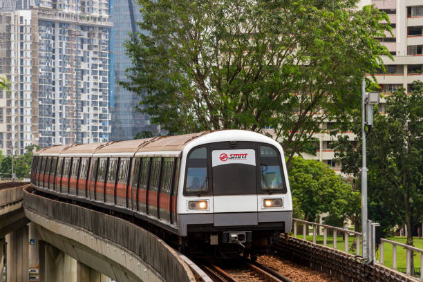 A Train Of Singapore's Mass Rapid Transit (MRT) Metro System Jurong East, Singapore - February 21, 2016 : The MRT Is A Heavy Rail Rapid Transit System That Constitutes The Bulk Of The Railway Network singapore mrt stock pictures, royalty-free photos & images
