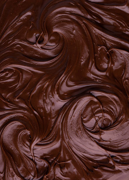 istock Food texture of melted chocolate or spread. 1324163203
