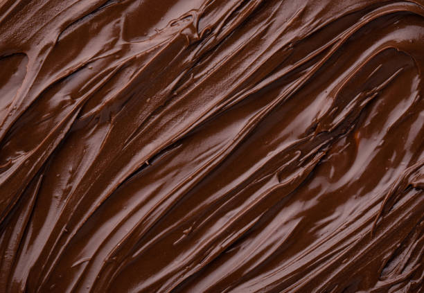 istock Food texture of melted chocolate or spread. 1324163204