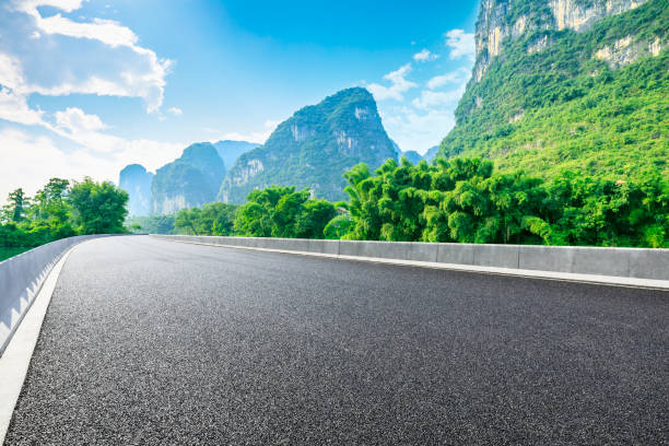 istock Mountain road natural landscape under blue sky. 1324163869