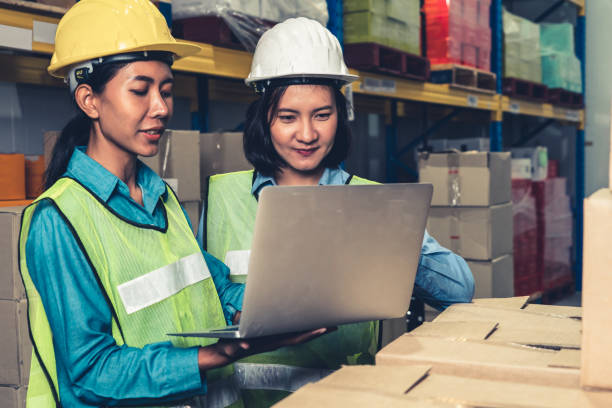 istock Female warehouse worker working at the storehouse 1324165711