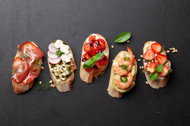 istock Appetizers board with traditional spanish tapas set. Italian antipasti brushetta snacks 1324171333