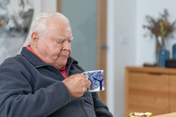 istock Senior Man Drinking Tea or Coffee at Home 1324171481