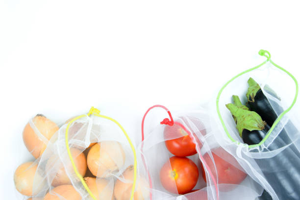 istock Vegetables in the grocery bag on a white background. Copy space, flat lay. Zero waste concept. 1324172566