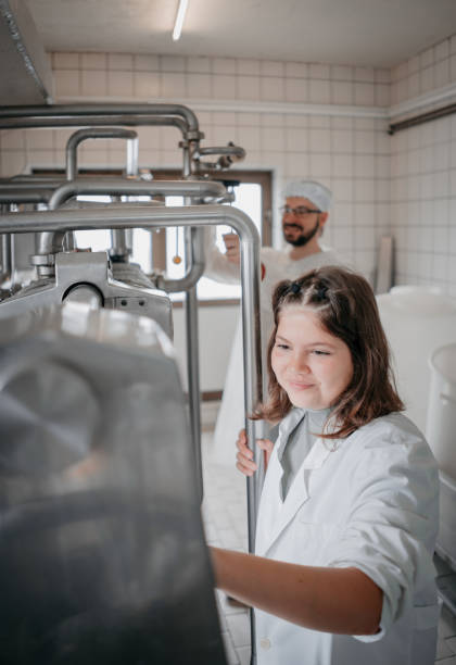 istock A worker checks a product in a dairy factory 1324180748