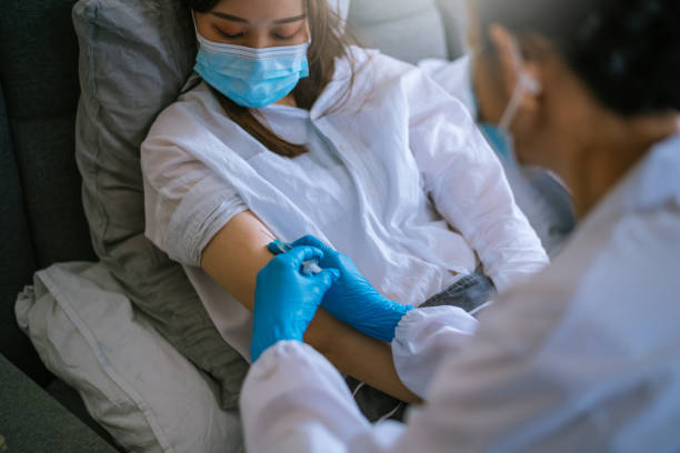 istock The doctor prepares the syringe for vaccination 1324182054