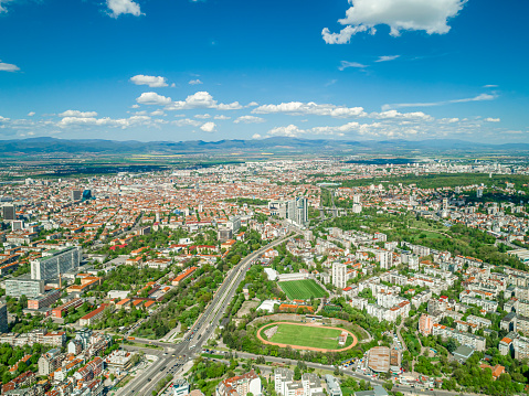 Wide aerial view if Sofia city, Bulgaria. The scene is situated in Sofia, Bulgaria - Eastern Europe. (Bulgarian: бул.България, София, България) The footage is shot on drone.