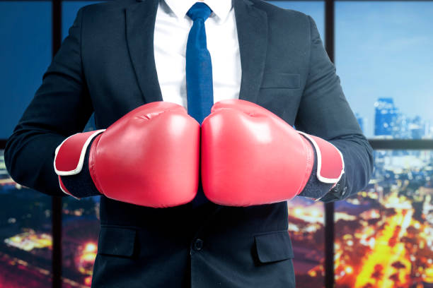 istock Businessman with red boxing gloves 1324186211