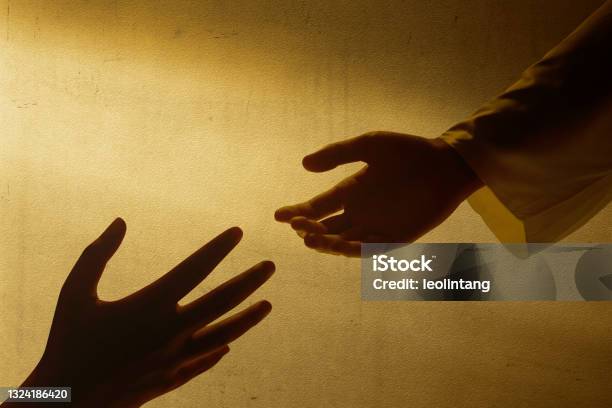 Jesus Christ Giving A Helping Hand To Human Stock Photo - Download Image Now - Jesus Christ, Rescue, Spirituality