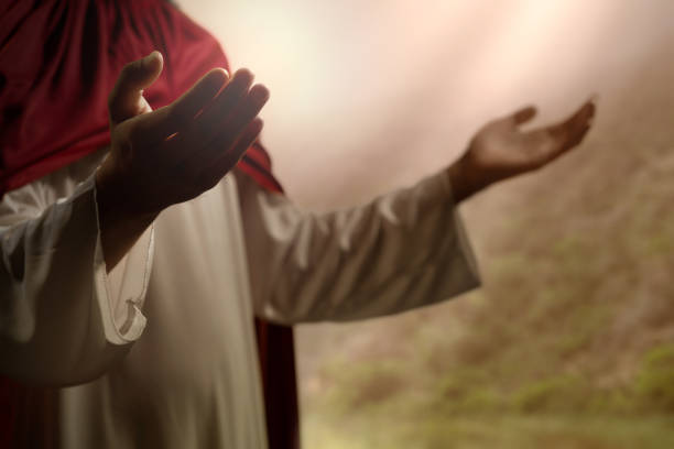 Jesus Christ praying to god Jesus Christ praying to god with sunlight background christ the redeemer stock pictures, royalty-free photos & images