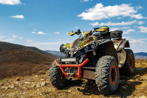 istock Atv car in the mountains on sunny day 1324186966