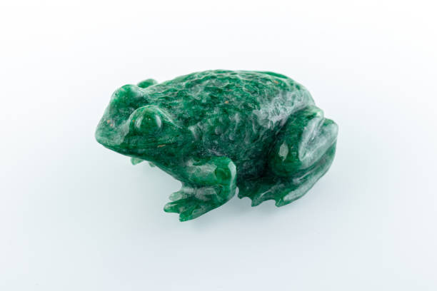 istock beautiful figurine of a toad made of malachite on a white background 1324188314