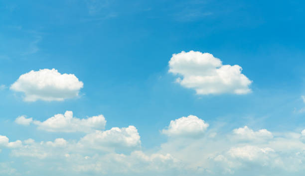 istock White fluffy cumulus clouds on blue sky with copy space for text. White puffy cloudscape. Beauty in nature. White cumulus clouds texture background. Sky on sunny day. Pure white clouds. Cloudscape. 1324189200