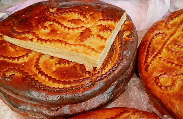 Photo of Stack of Delicious Gata, a Traditional Armenian Sweet Breads for Sale at Foothill of Geghard Monastery, Armenia