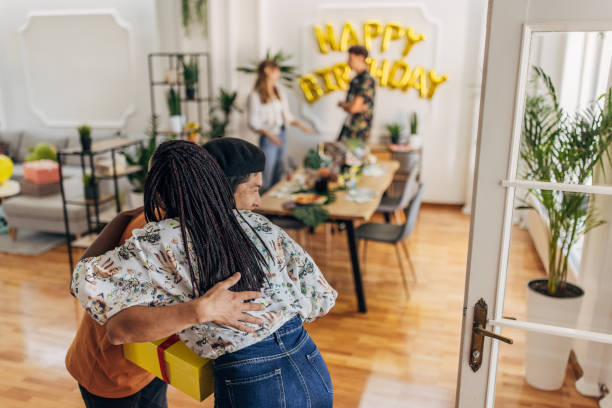 istock Friend arrival to a birthday party 1324192528