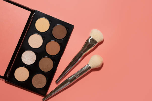 istock contouring kit with brushes, bronzers and highlighters of different shades 1324196683
