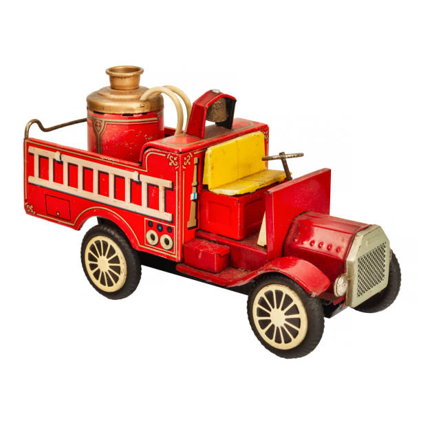 istock Ancient rusted toy fire truck isolated on a white background 1324198014