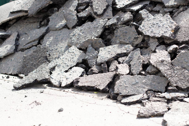 istock Broken asphalt. Pieces of an asphalt road. 1324198781