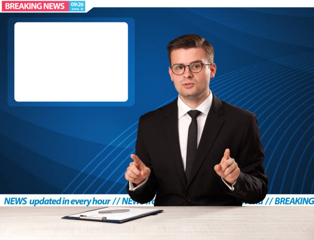 istock Television reporter telling breaking news at his studio desk with copy space 1324199367