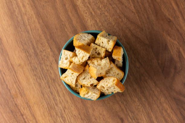 istock Delicious crunchy croutons on the table. 1324208388