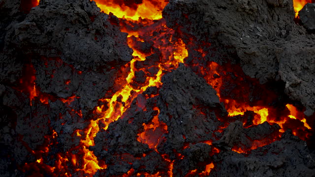Scenic close up view of the burning fresh lava of the volcano eruption in Iceland