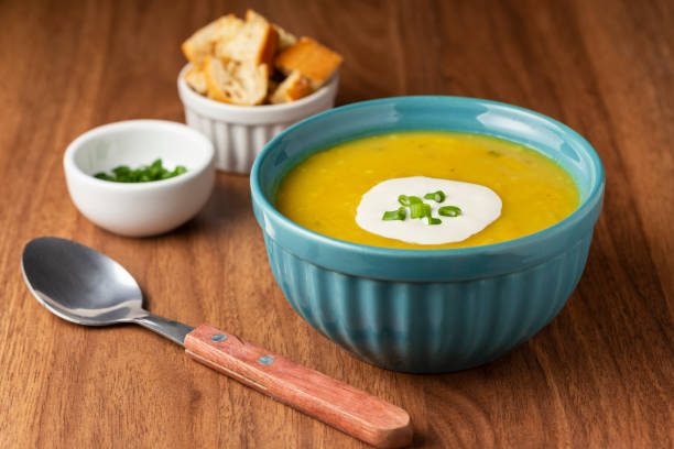 istock Bowl with pumpkin soup on the table. 1324212610