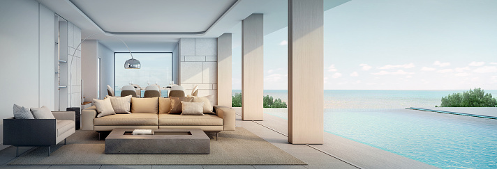 Panorama of living room modern beach house or hotel with swimming pool and terrace.3d rendering