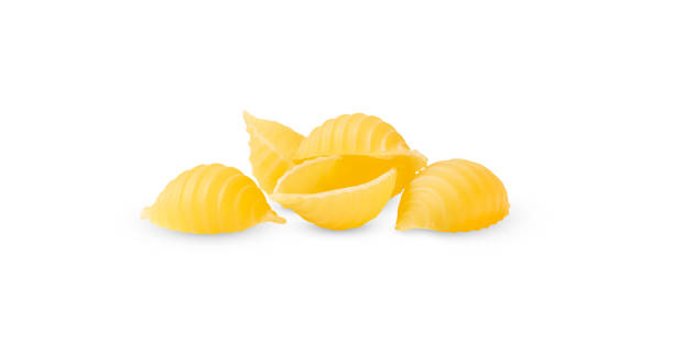 istock pile of seashell-shaped pasta isolated on a white background 1324214601