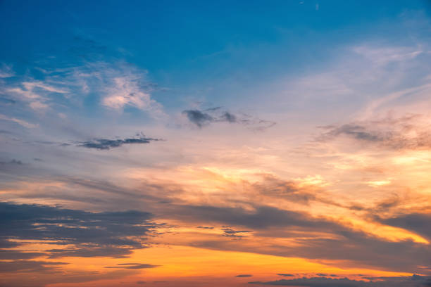 istock Beautiful cloudscape and dramatic sunset over mountain and sea. 1324215439