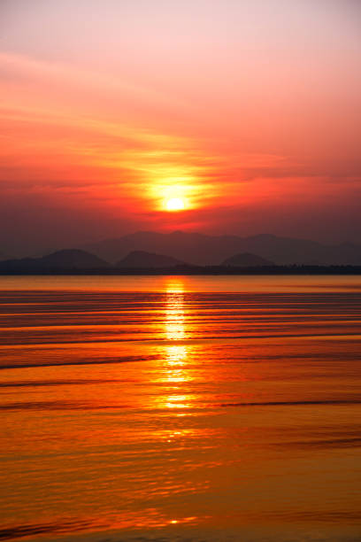istock Dramatic sunset over mountain and sea. 1324216457