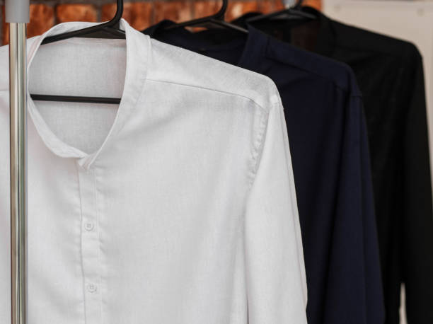istock Clothes hanger with assorted linen shirts 1324216540