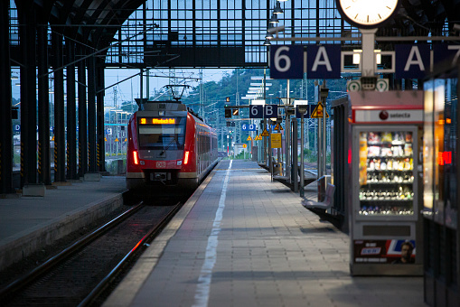 Wiesbaden, Germany - June 17, 2021: Leaving S-Bahn train at railroad station platform of Wiesbaden central station (Hauptbahnhof). S-Bahn is a combined city center and suburban railway system metro in Germany. Wiesbaden is a city in central western Germany and the capital of the state of Hesse.