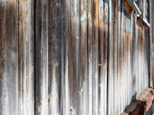 istock view along the old wooden wall. Selective Focus 1324218065