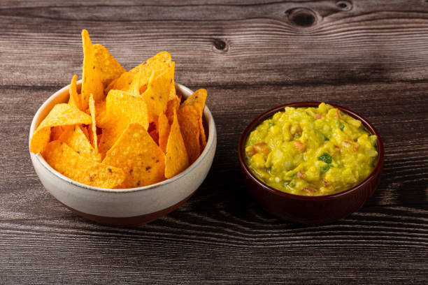 istock Nachos with guacamole on the table. 1324220747