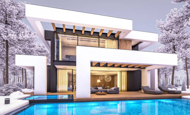 istock 3d rendering of modern house in luxurious style in winter evening 1324220755