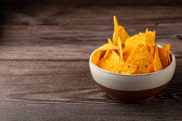 istock Bowl with nachos on the table. 1324221051