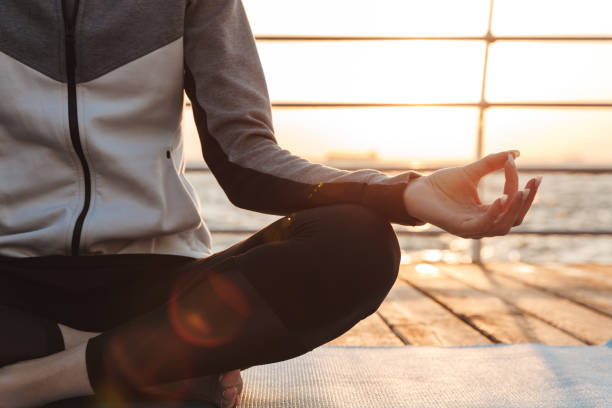 istock Cropped image of a young girl meditating 1324222396